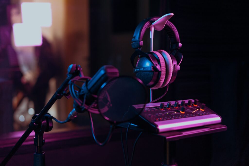 Headphones hanging on a microphone